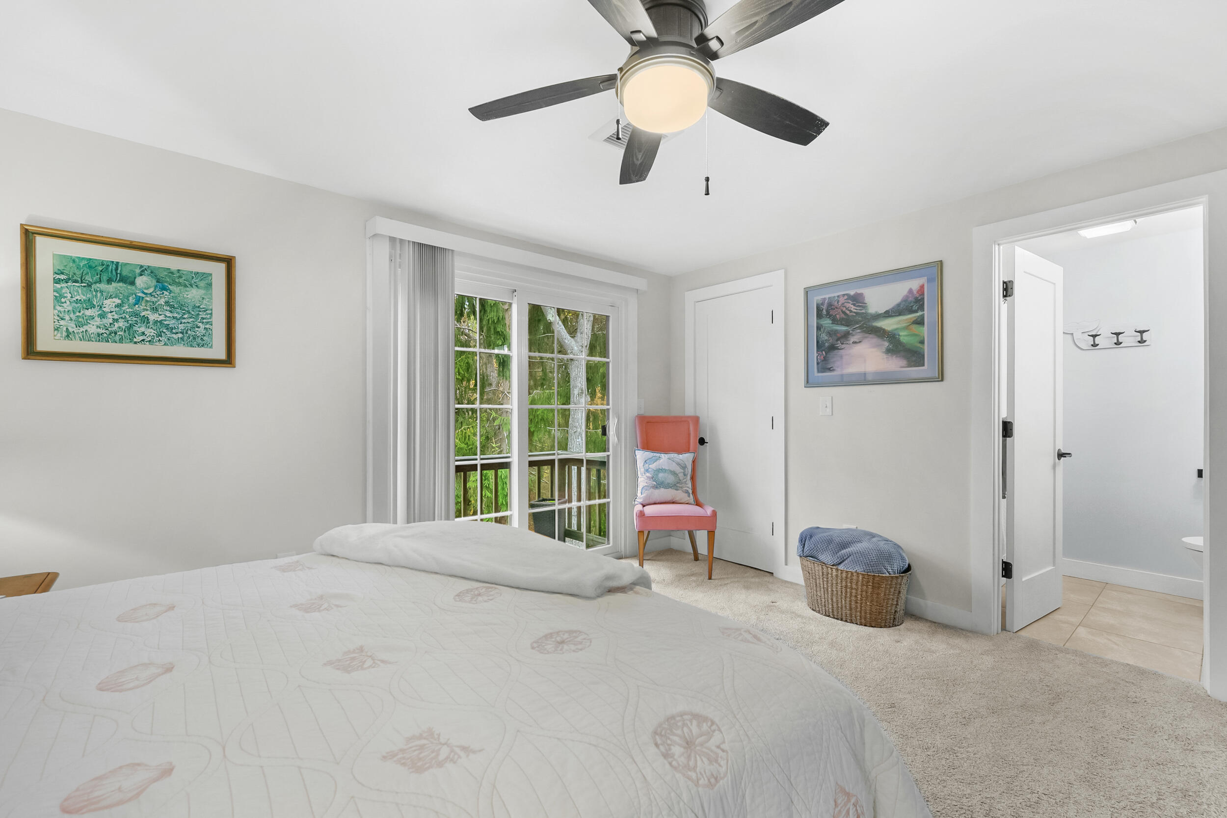 195 Falmouth Road, Unit 7B Mashpee, MA 02649 - Photo 19 of 38 a bedroom with furniture and a large window