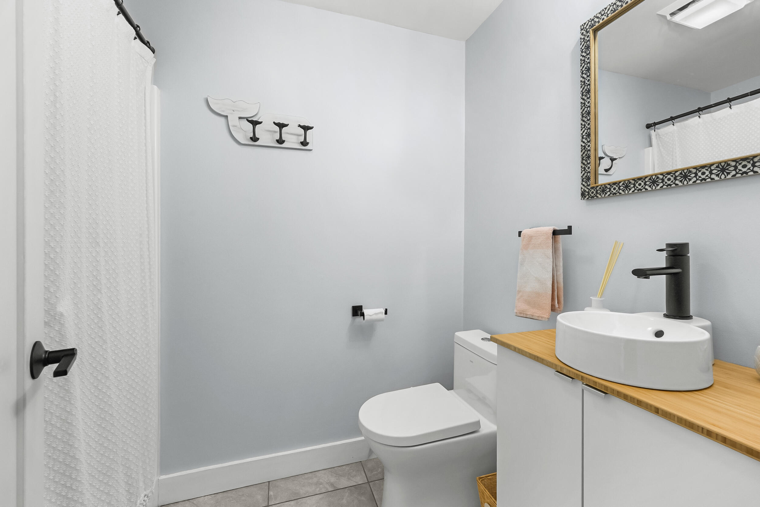 195 Falmouth Road, Unit 7B Mashpee, MA 02649 - Photo 22 of 38 a bathroom with a sink and a toilet