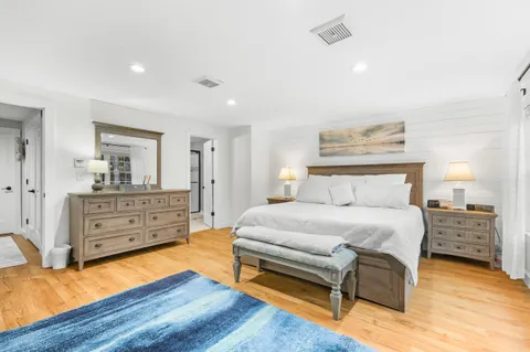 a bedroom with a bed and furniture