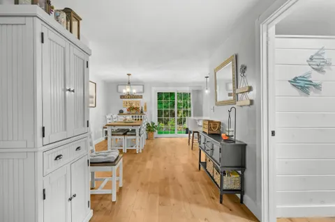 a kitchen with stainless steel appliances a stove a refrigerator and cabinets