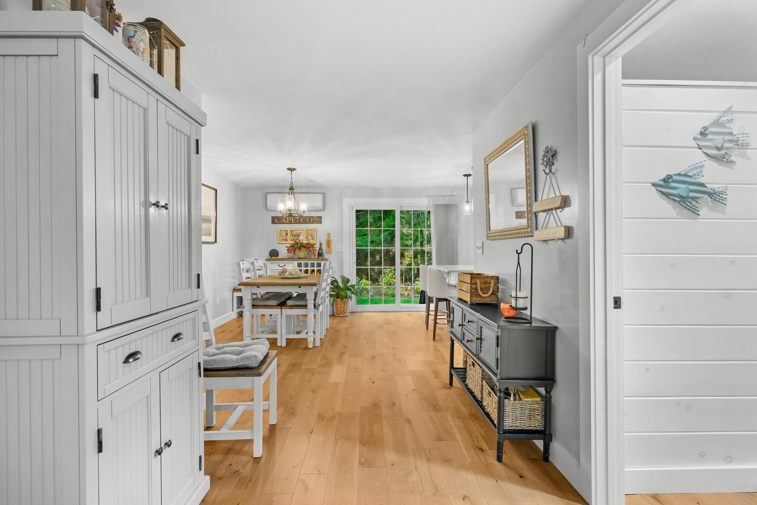 195 Falmouth Road, Unit 7B Mashpee, MA 02649 - Photo 8 of 38 a kitchen with stainless steel appliances a stove a refrigerator and cabinets