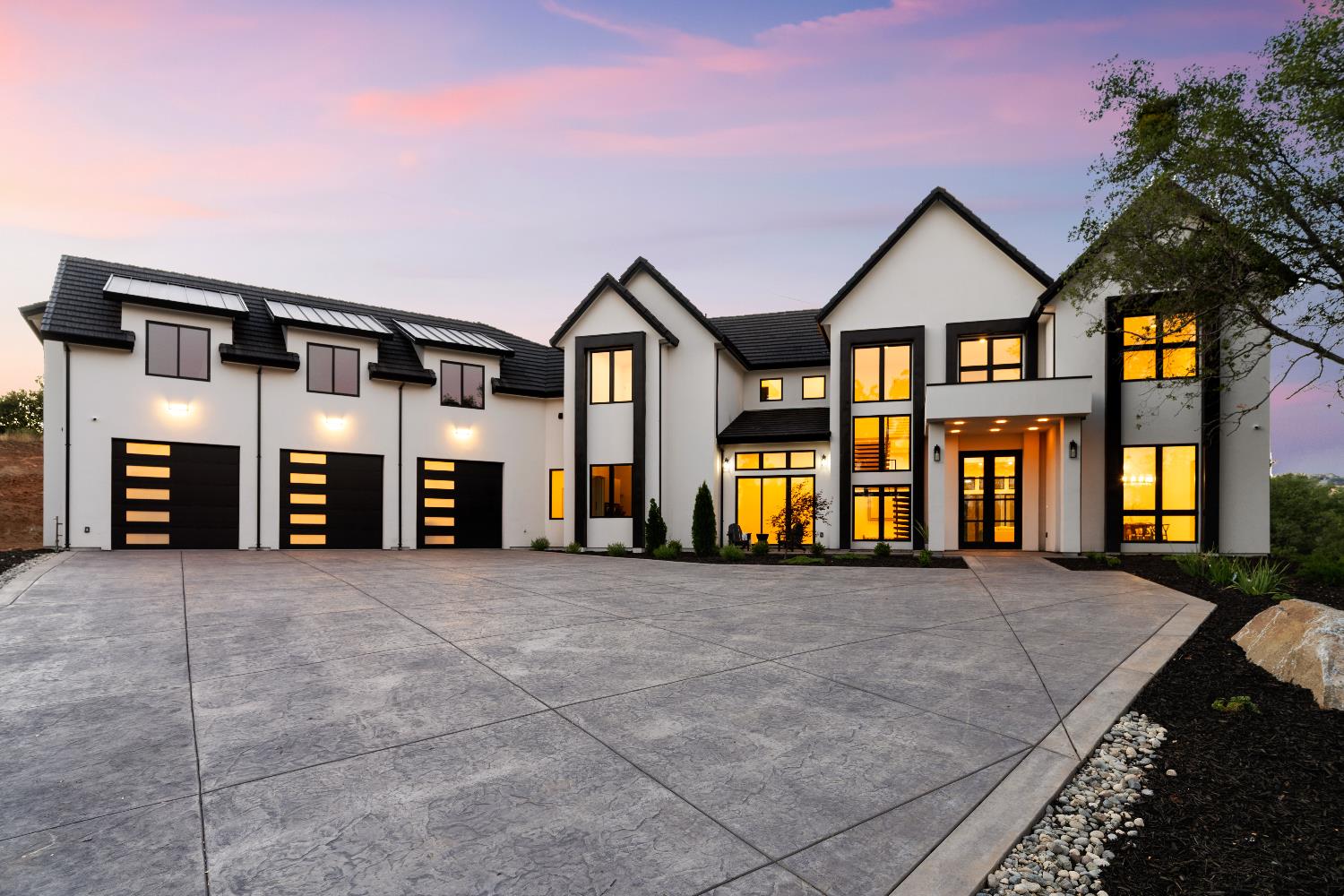 9995 Powerhouse Road Newcastle, CA 95658 - Photo 1 of 1 a front view of a house with large windows