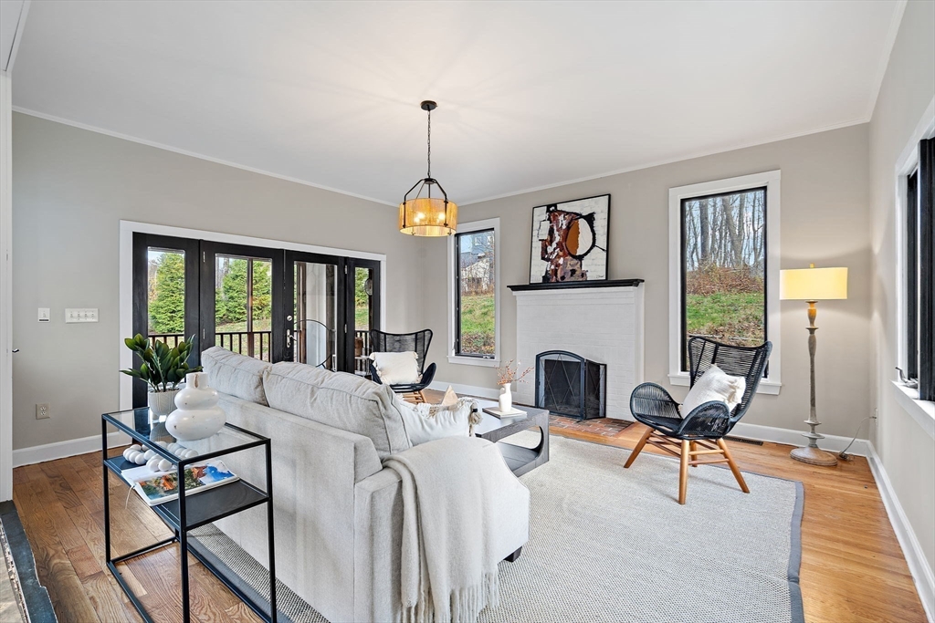 169 Main Street Acton, MA 01720 - Photo 13 of 39 a view of a livingroom with furniture window and wooden floor