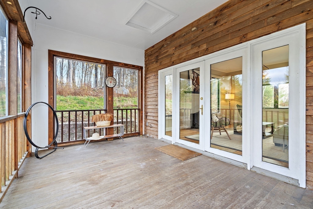 169 Main Street Acton, MA 01720 - Photo 16 of 39 a view of an entryway with a garden