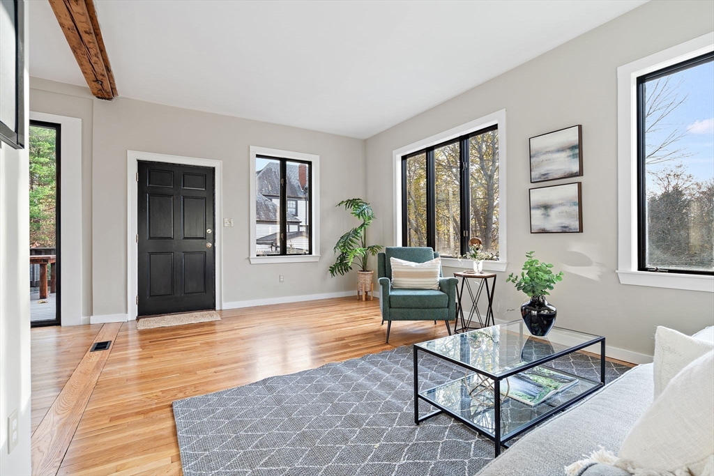 169 Main Street Acton, MA 01720 - Photo 3 of 39 a living room with furniture and window
