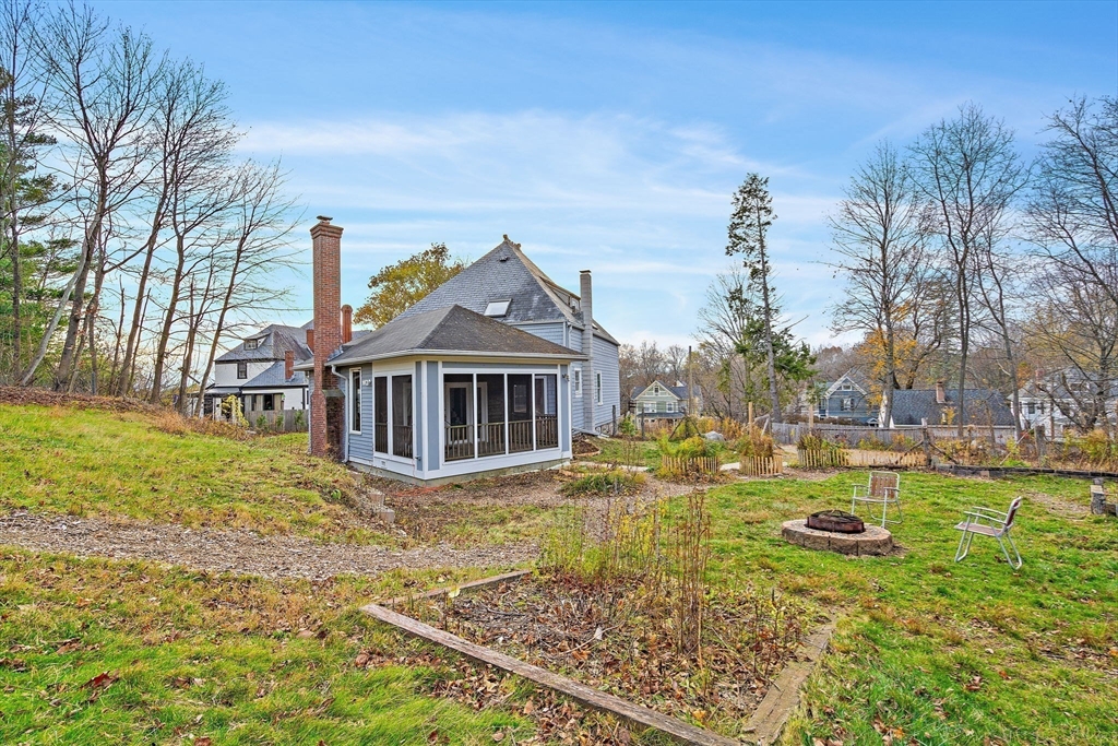 169 Main Street Acton, MA 01720 - Photo 33 of 39 a view of a house with a yard