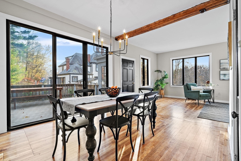 169 Main Street Acton, MA 01720 - Photo 5 of 39 a view of a dining room with furniture window and wooden floor