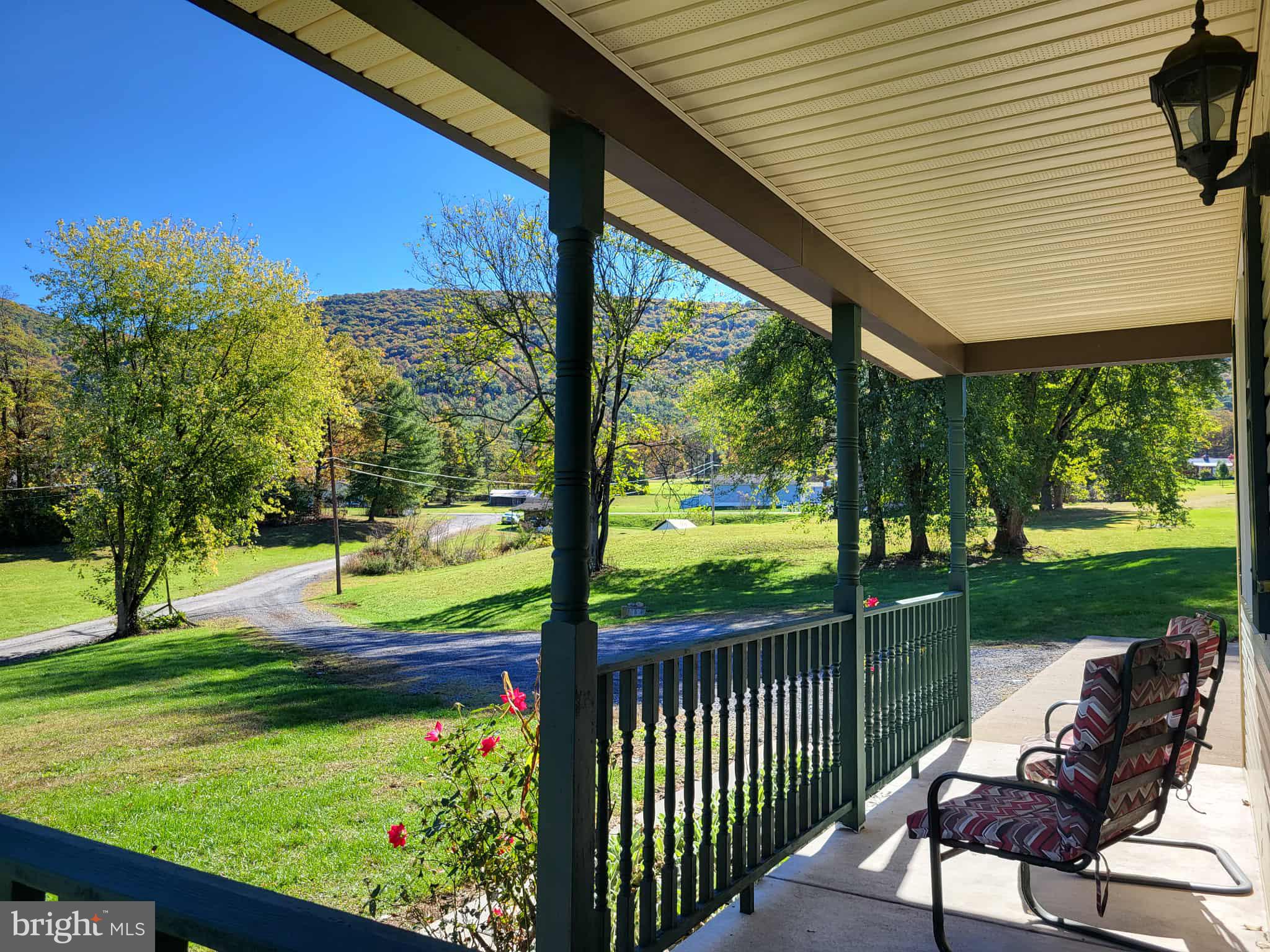 10 Flat Land Road Lewistown, PA 17044 - Photo 12 of 64 a view of a patio with a table chairs and a backyard