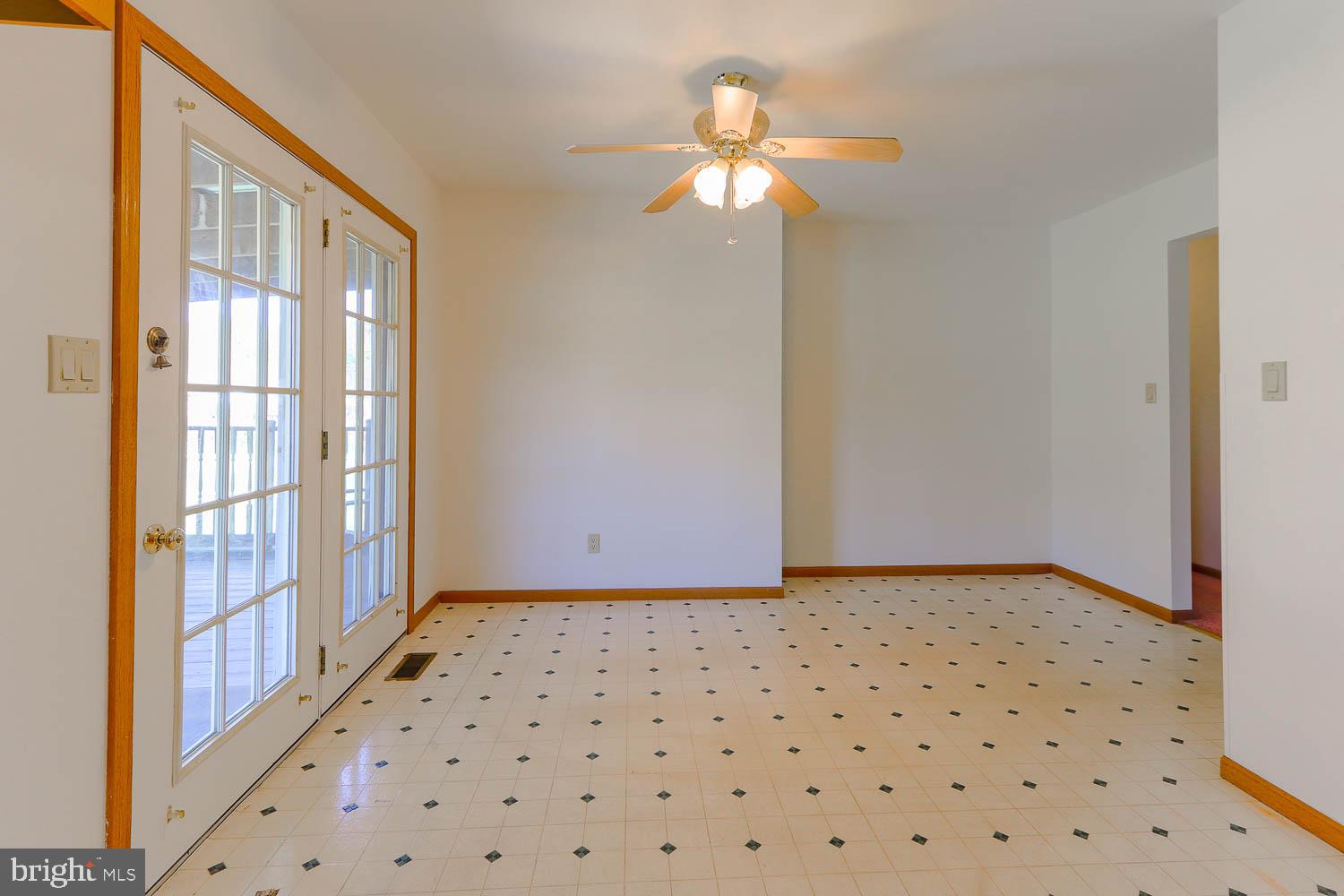 10 Flat Land Road Lewistown, PA 17044 - Photo 20 of 64 a view of a hallway with wooden floor and a chandelier