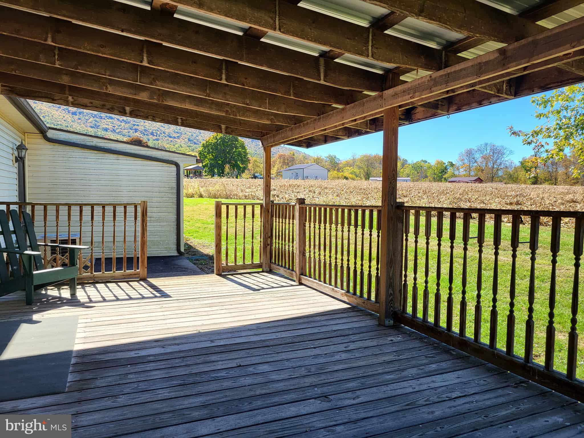 10 Flat Land Road Lewistown, PA 17044 - Photo 23 of 64 a view of a patio with a table chairs and wooden floor
