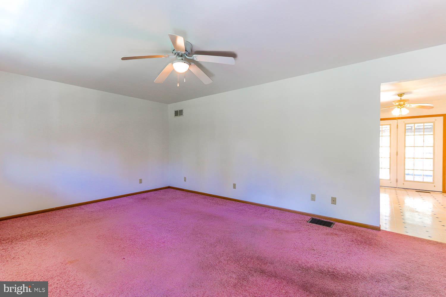 10 Flat Land Road Lewistown, PA 17044 - Photo 25 of 64 an empty room with windows and fan
