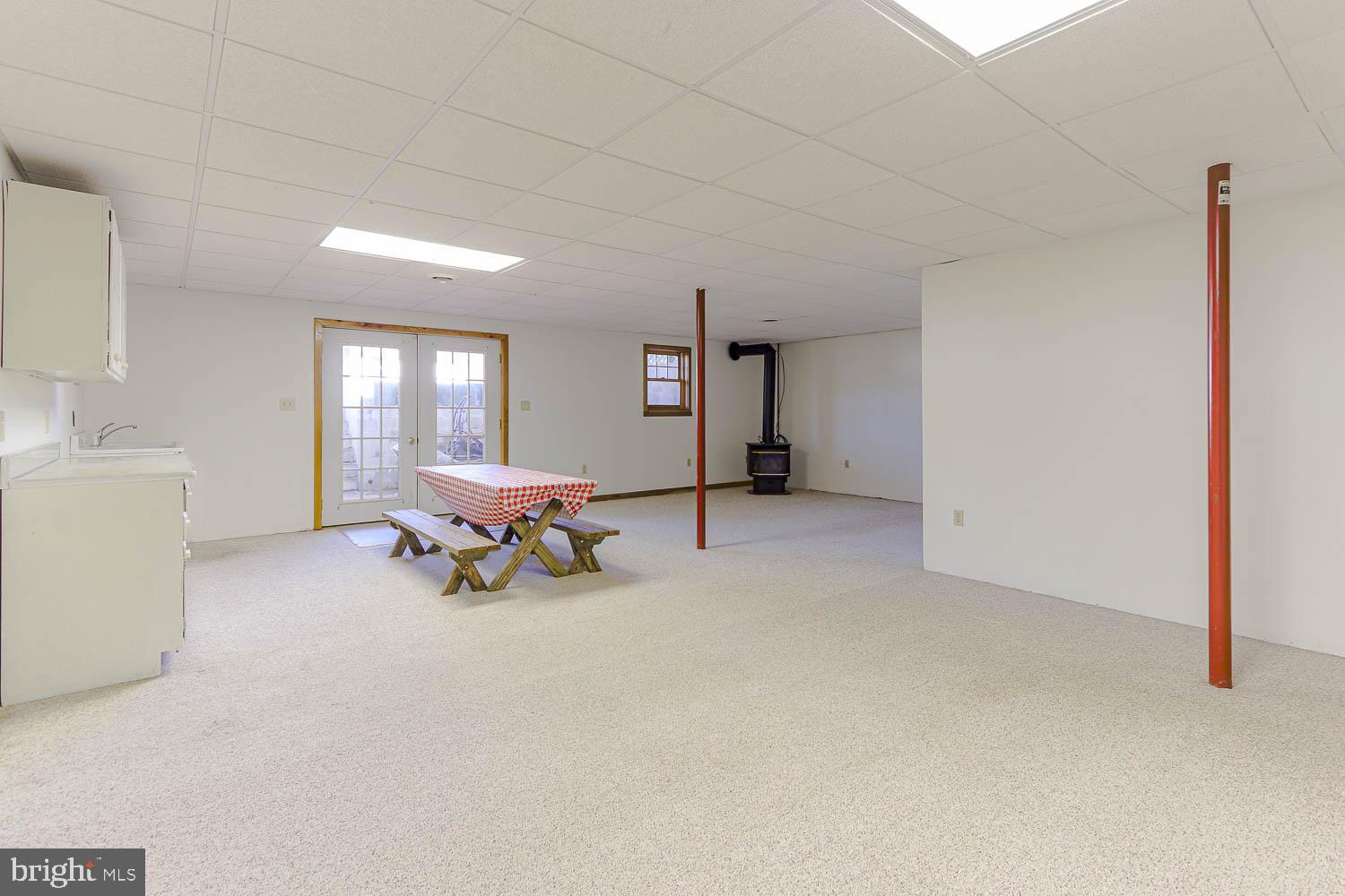 10 Flat Land Road Lewistown, PA 17044 - Photo 39 of 64 a living room with furniture and a chandelier