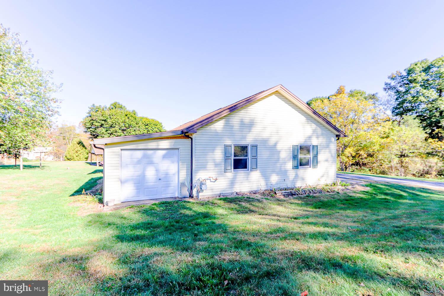 10 Flat Land Road Lewistown, PA 17044 - Photo 4 of 64 a view of a house with backyard and garden