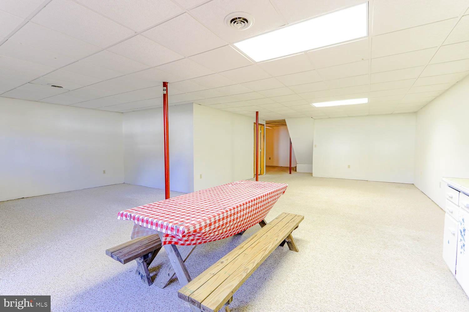 10 Flat Land Road Lewistown, PA 17044 - Photo 42 of 64 a room with a table chairs and wooden floor