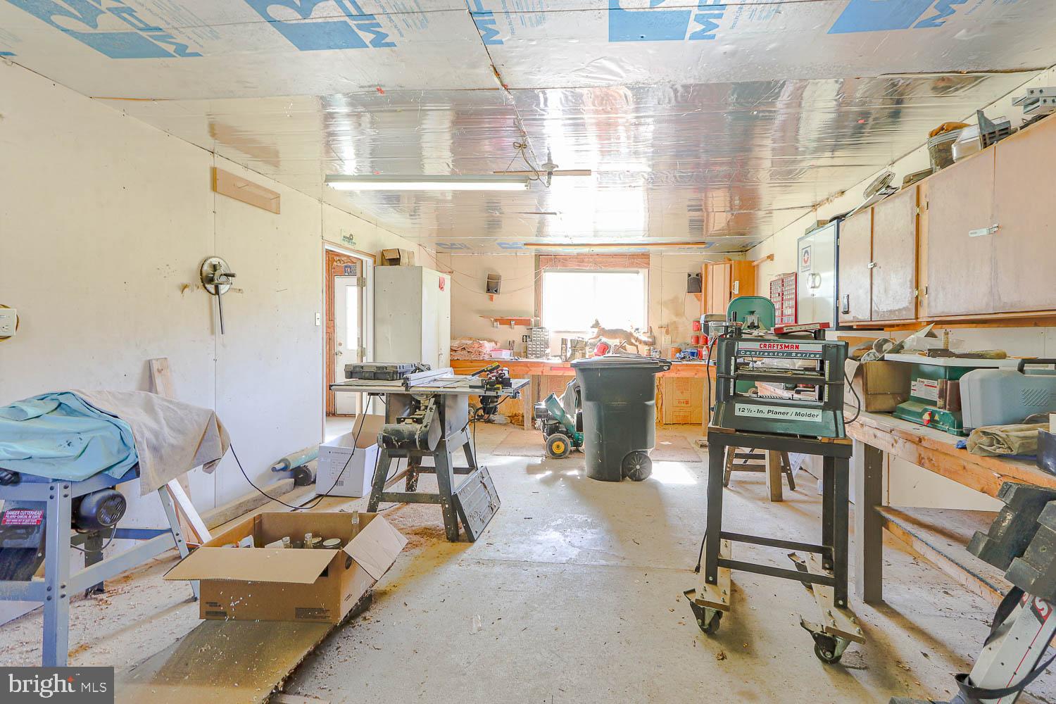 10 Flat Land Road Lewistown, PA 17044 - Photo 59 of 64 a living room with lots of furniture and a view of kitchen