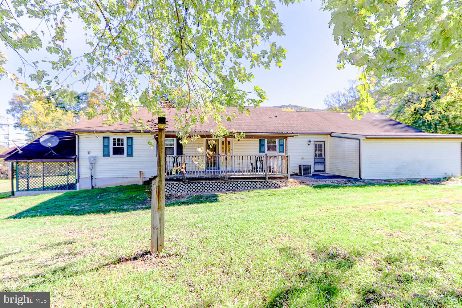 10 Flat Land Road Lewistown, PA 17044 - Photo 6 of 64 a view of a house with a yard and sitting area