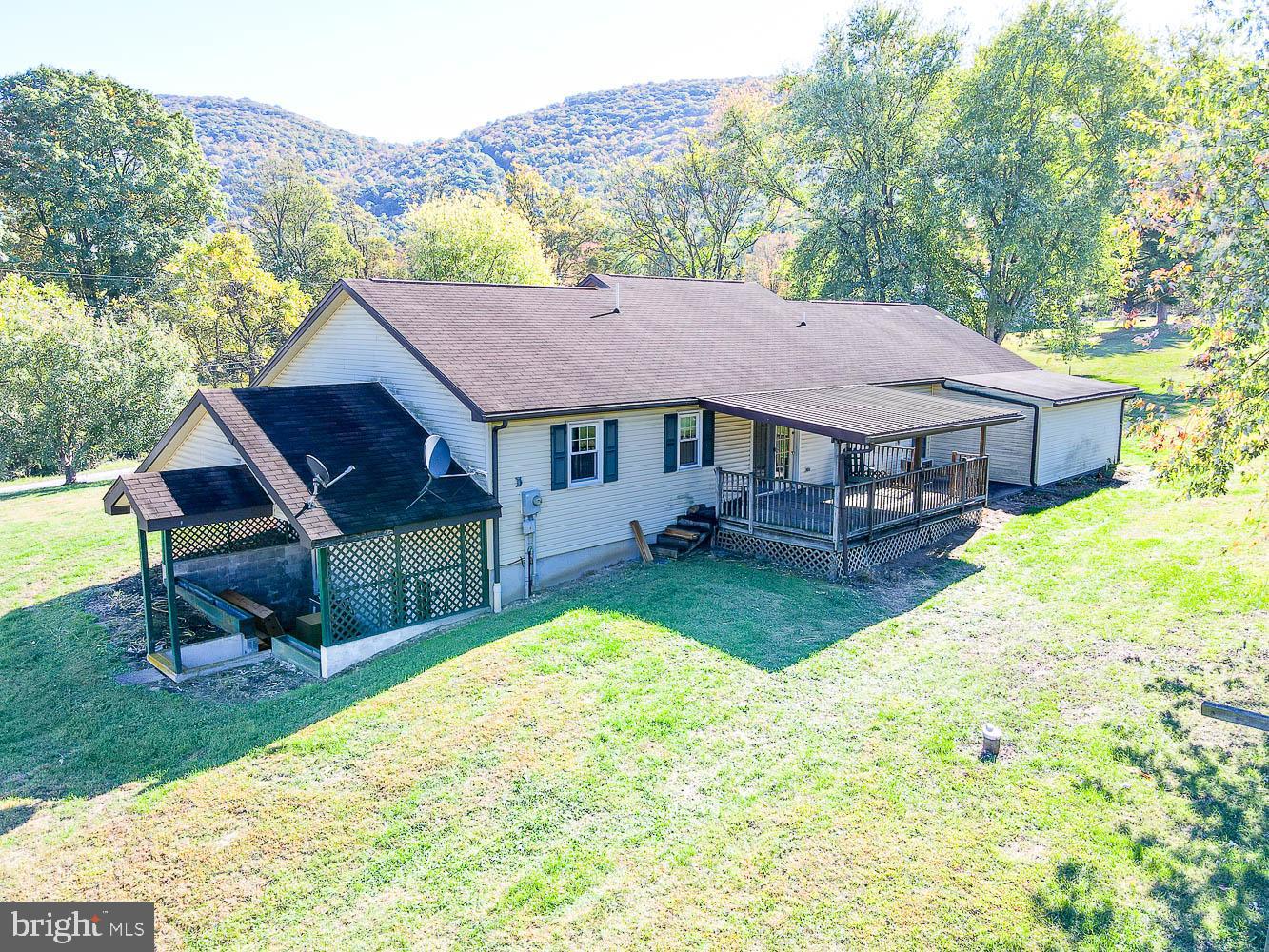 10 Flat Land Road Lewistown, PA 17044 - Photo 7 of 64 a view of a house with a yard porch and sitting area