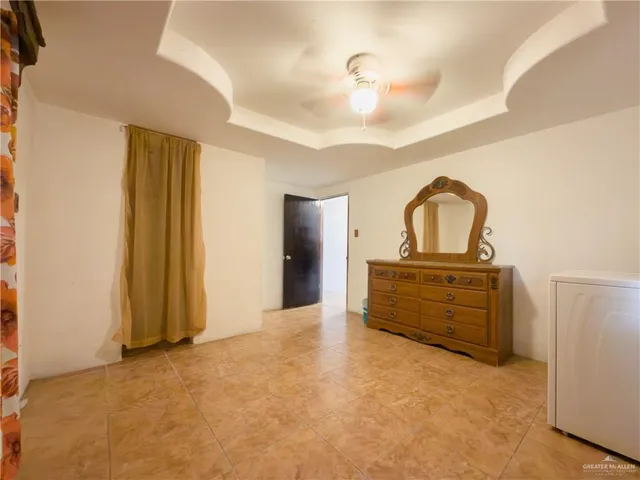 a view of a livingroom with furniture and toys