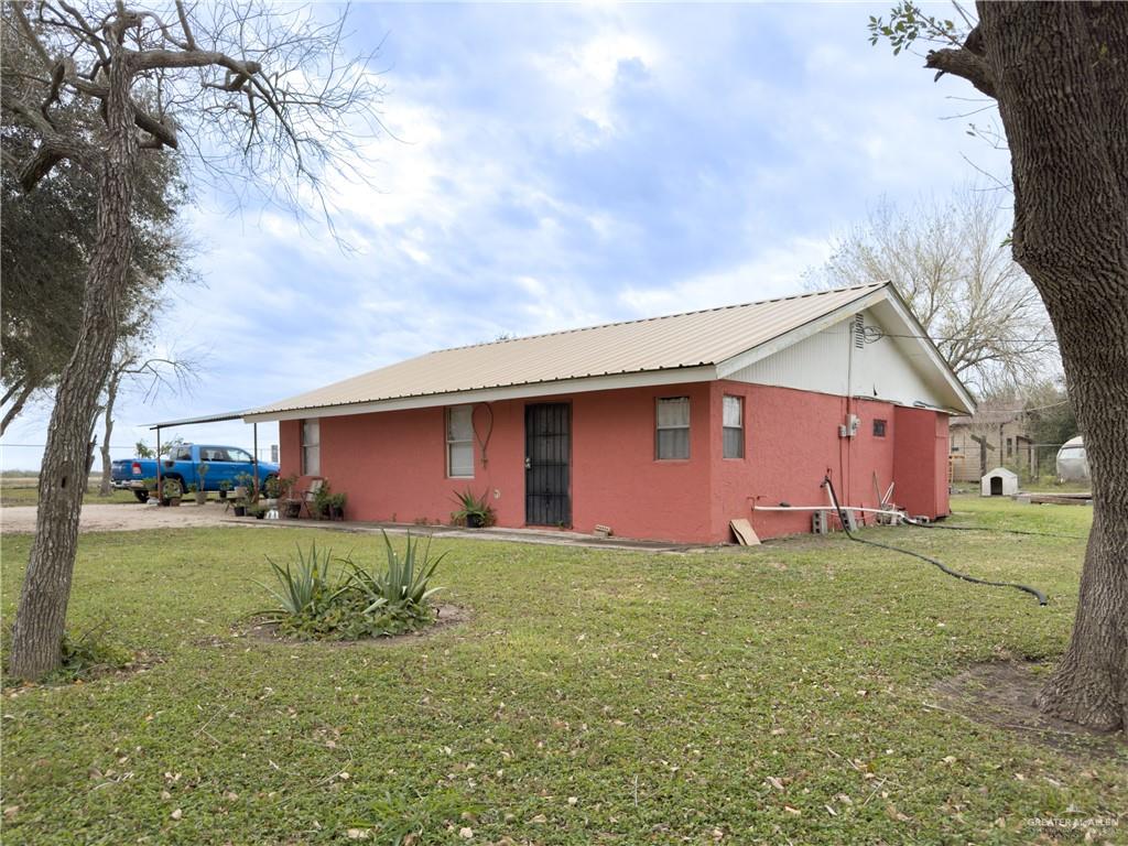 21707 Hidalgo Street Edcouch, TX 78538 - Photo 2 of 27 a house view with a outdoor space