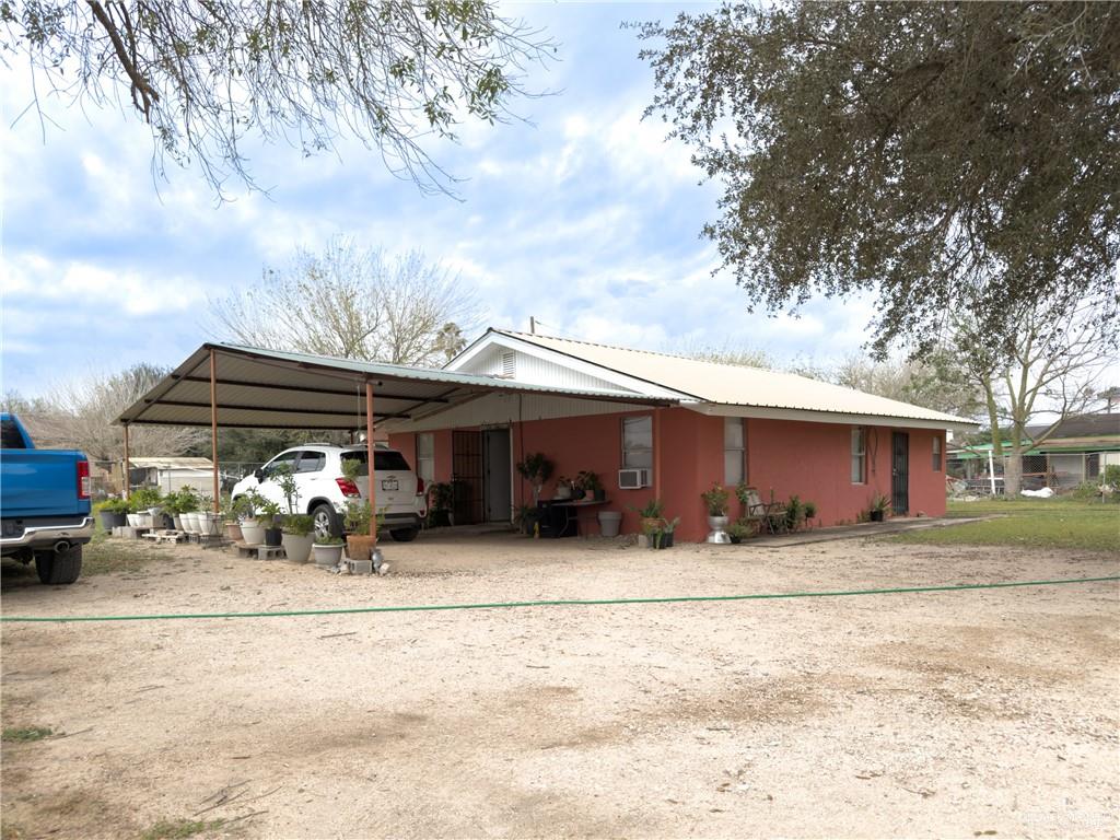 21707 Hidalgo Street Edcouch, TX 78538 - Photo 6 of 27 a view of a car park in front of house