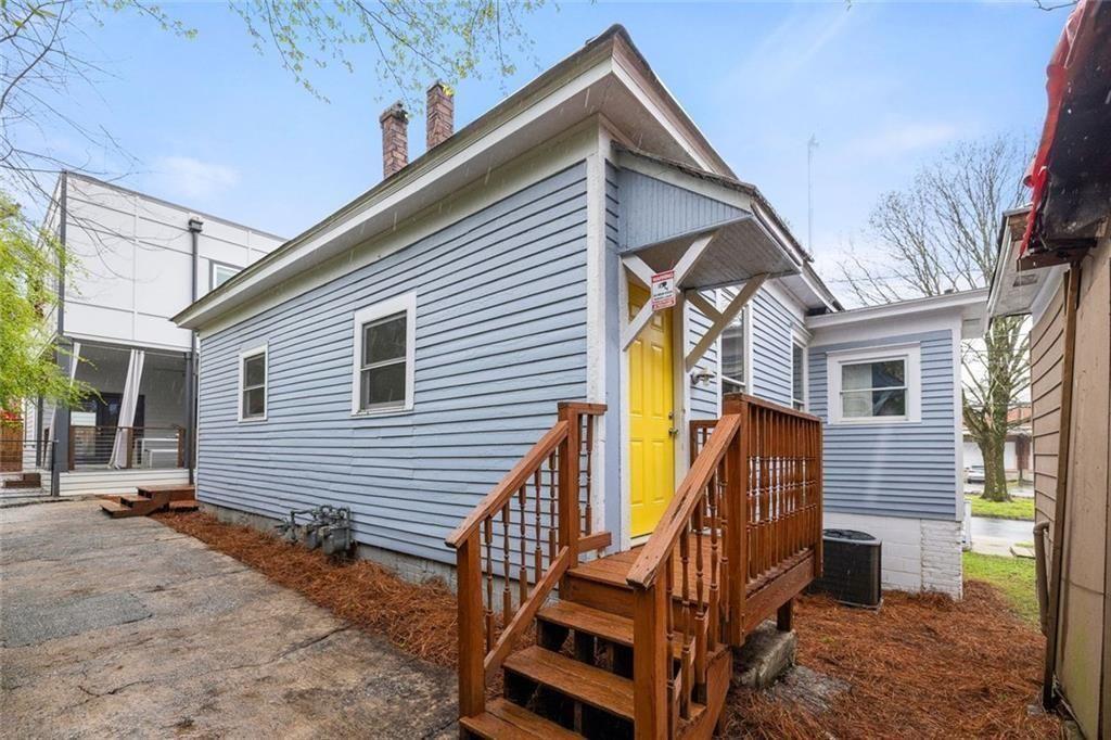 796 Fulton Terrace Southeast Atlanta, GA 30316 - Photo 12 of 35 a view of house with wooden stairs and a large tree