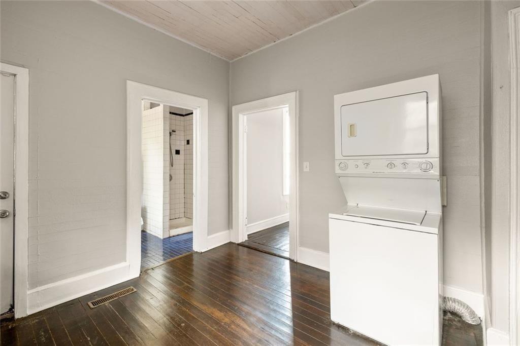 796 Fulton Terrace Southeast Atlanta, GA 30316 - Photo 21 of 35 an empty room with wooden floor & cabinet