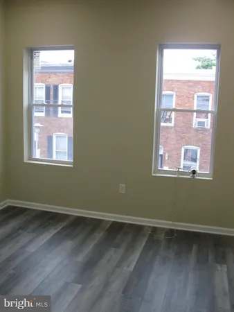 a view of a room that has a window in it