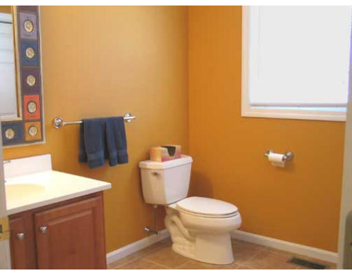 389 Mulpus Road Lunenburg, MA 01462 - Photo 11 of 26 a bathroom with a toilet and a sink