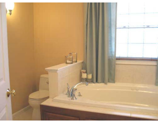 389 Mulpus Road Lunenburg, MA 01462 - Photo 16 of 26 a bathroom with a sink and a toilet