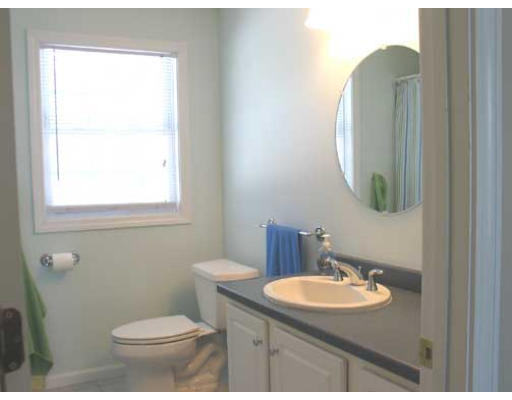 389 Mulpus Road Lunenburg, MA 01462 - Photo 18 of 26 a bathroom with a toilet sink and mirror