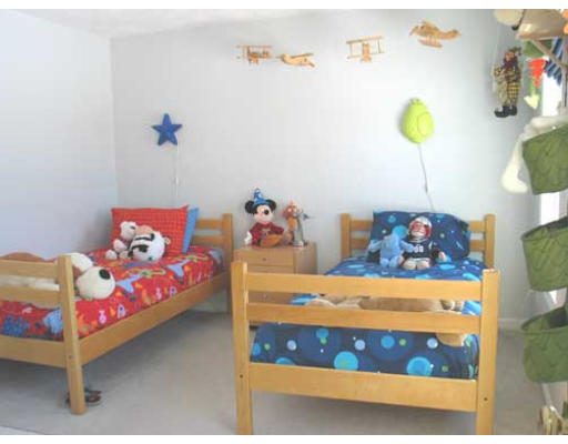 389 Mulpus Road Lunenburg, MA 01462 - Photo 19 of 26 a bedroom with a bed and a dresser in it