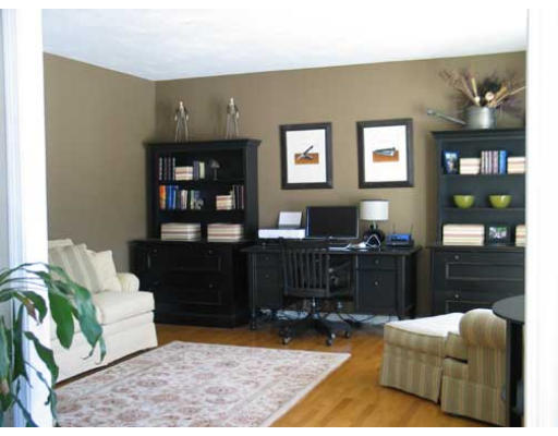 389 Mulpus Road Lunenburg, MA 01462 - Photo 3 of 26 a living room with furniture and wooden floor