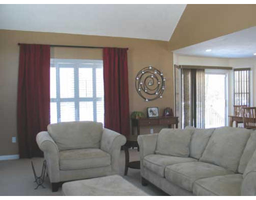 389 Mulpus Road Lunenburg, MA 01462 - Photo 7 of 26 a living room with furniture and a large window