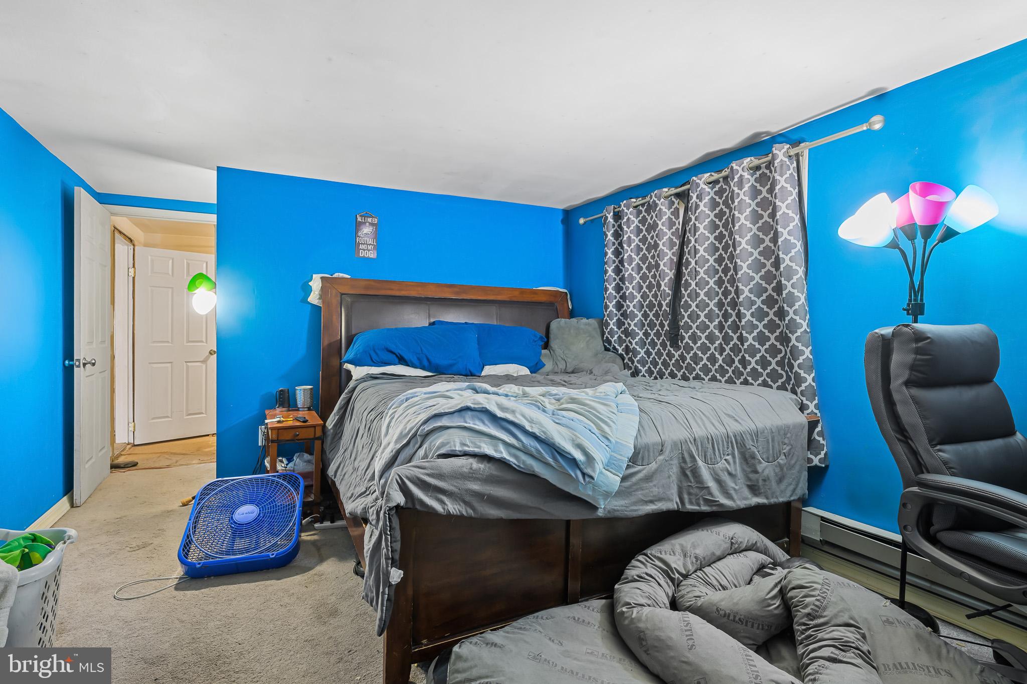 8 Augusta Drive Newark, DE 19713 - Photo 18 of 23 a bedroom with a bed and a couch