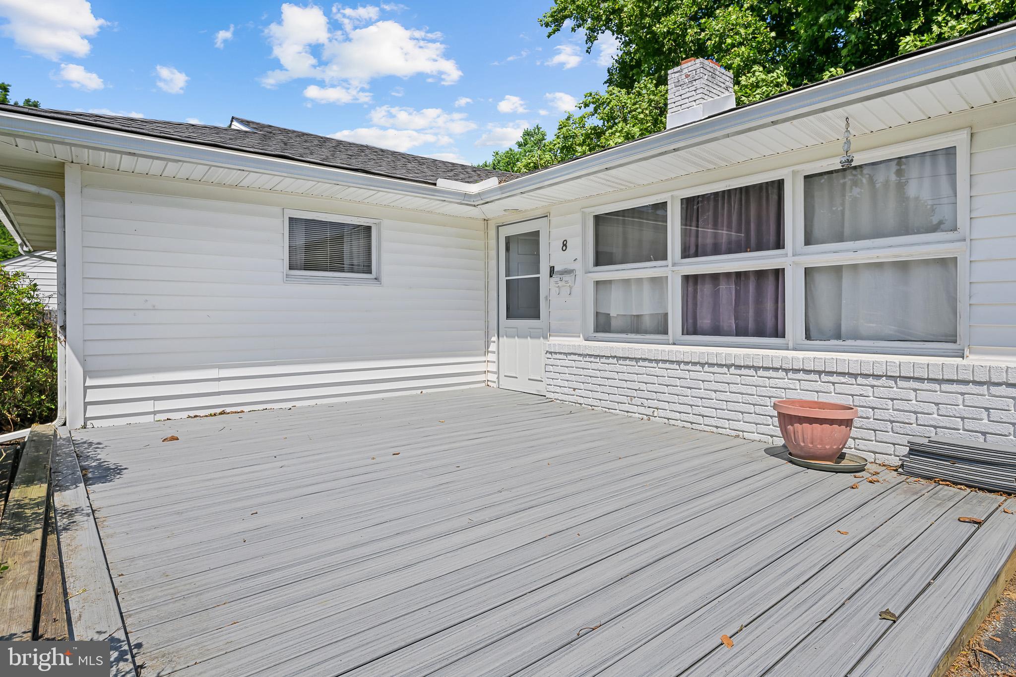 8 Augusta Drive Newark, DE 19713 - Photo 3 of 23 a front view of a house with seating space