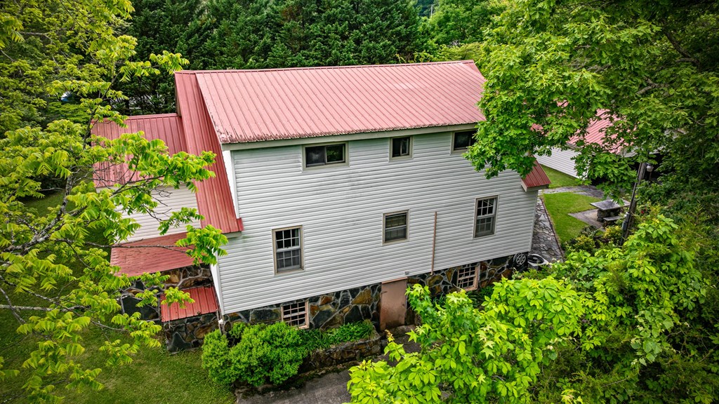 16 Hollow Springs Road Blue Ridge, GA 30513 - Photo 15 of 62 a aerial view of a house with a yard and sitting area
