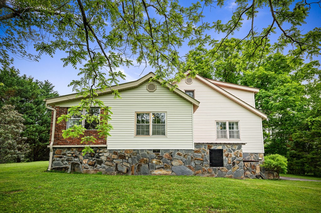16 Hollow Springs Road Blue Ridge, GA 30513 - Photo 23 of 62 a view of a house with a yard