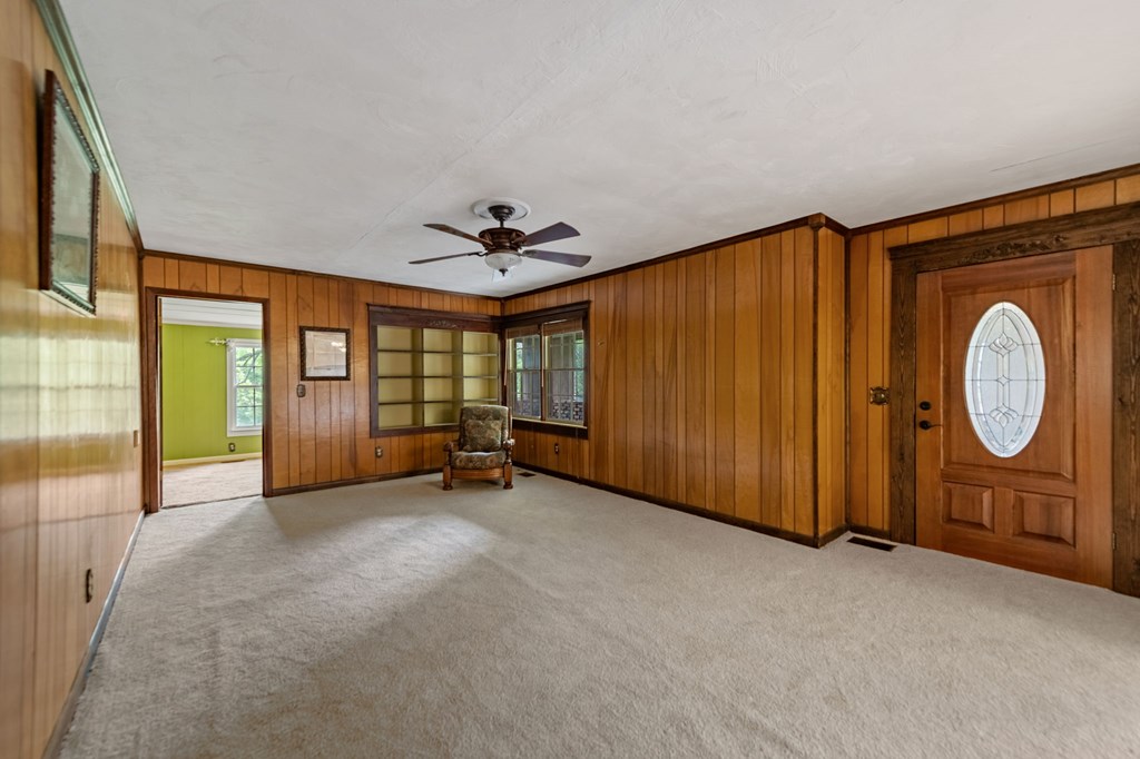 16 Hollow Springs Road Blue Ridge, GA 30513 - Photo 41 of 62 a view of an empty room with window and chandelier fan