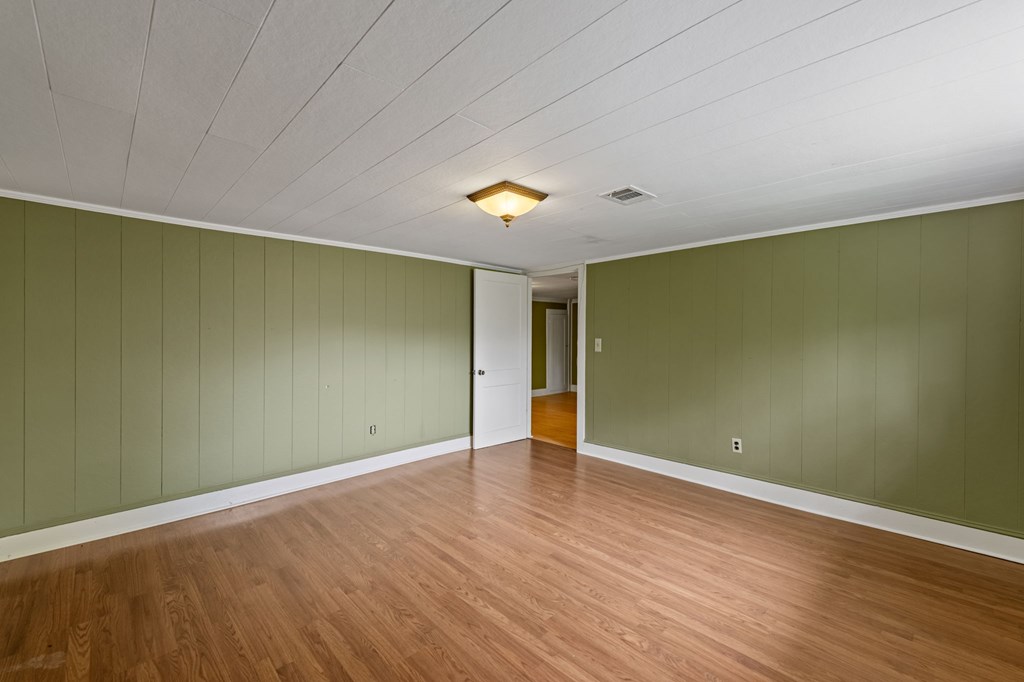 16 Hollow Springs Road Blue Ridge, GA 30513 - Photo 44 of 62 a view of empty room with wooden floor