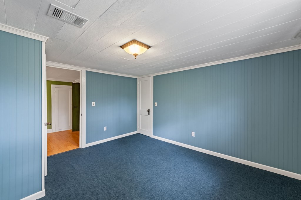 16 Hollow Springs Road Blue Ridge, GA 30513 - Photo 55 of 62 an empty room with closet and windows