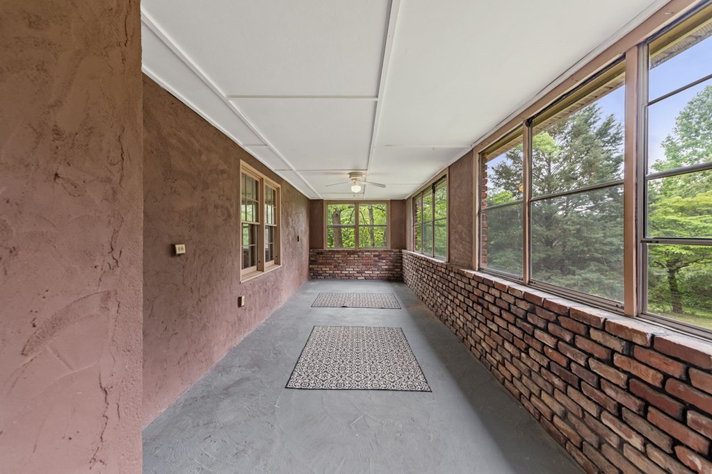 16 Hollow Springs Road Blue Ridge, GA 30513 - Photo 59 of 62 a view of a room with wooden floor and windows
