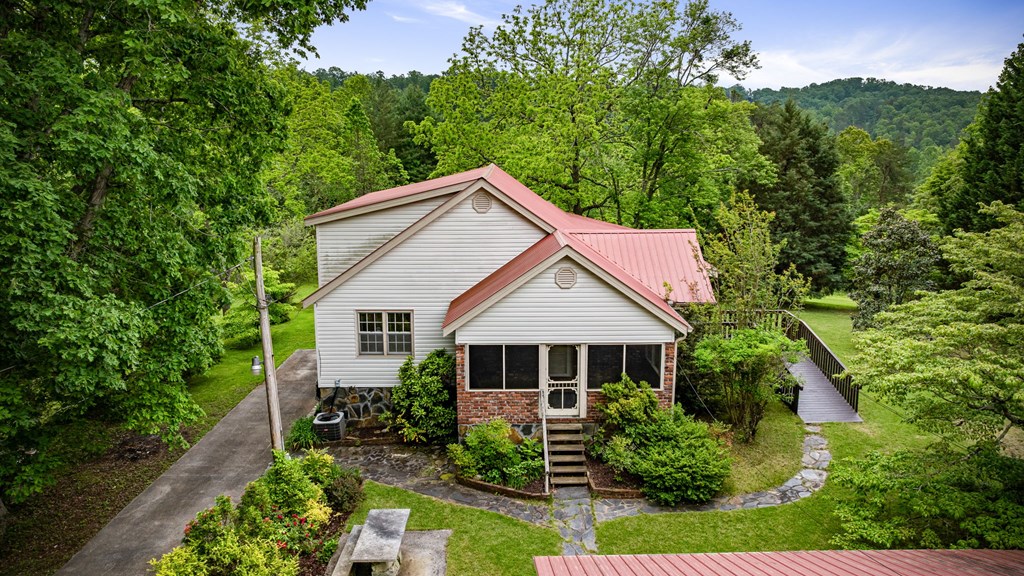 16 Hollow Springs Road Blue Ridge, GA 30513 - Photo 8 of 62 front view of a house with a yard