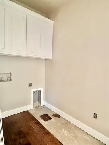 a view of kitchen with marble wall
