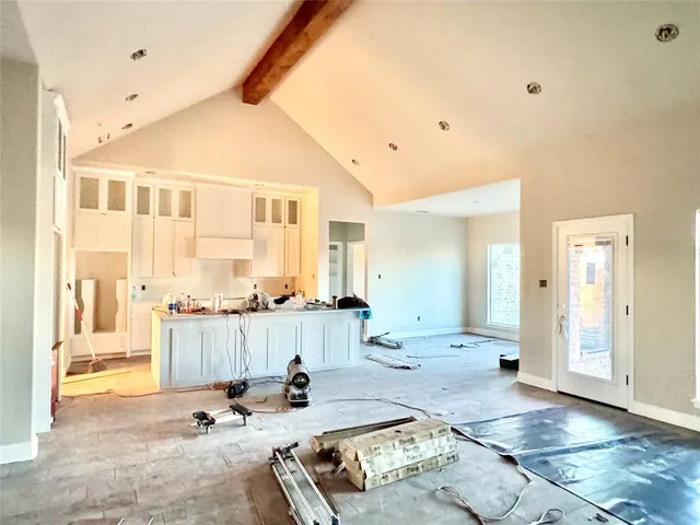 a room with pool table and glass door