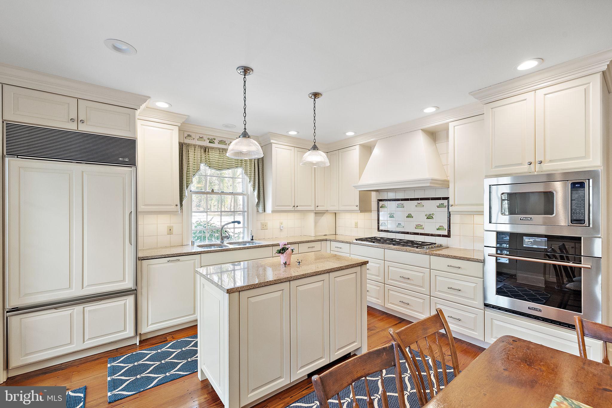 4615 Weldin Road Wilmington, DE 19803 - Photo 14 of 49 a kitchen with a sink stove and microwave