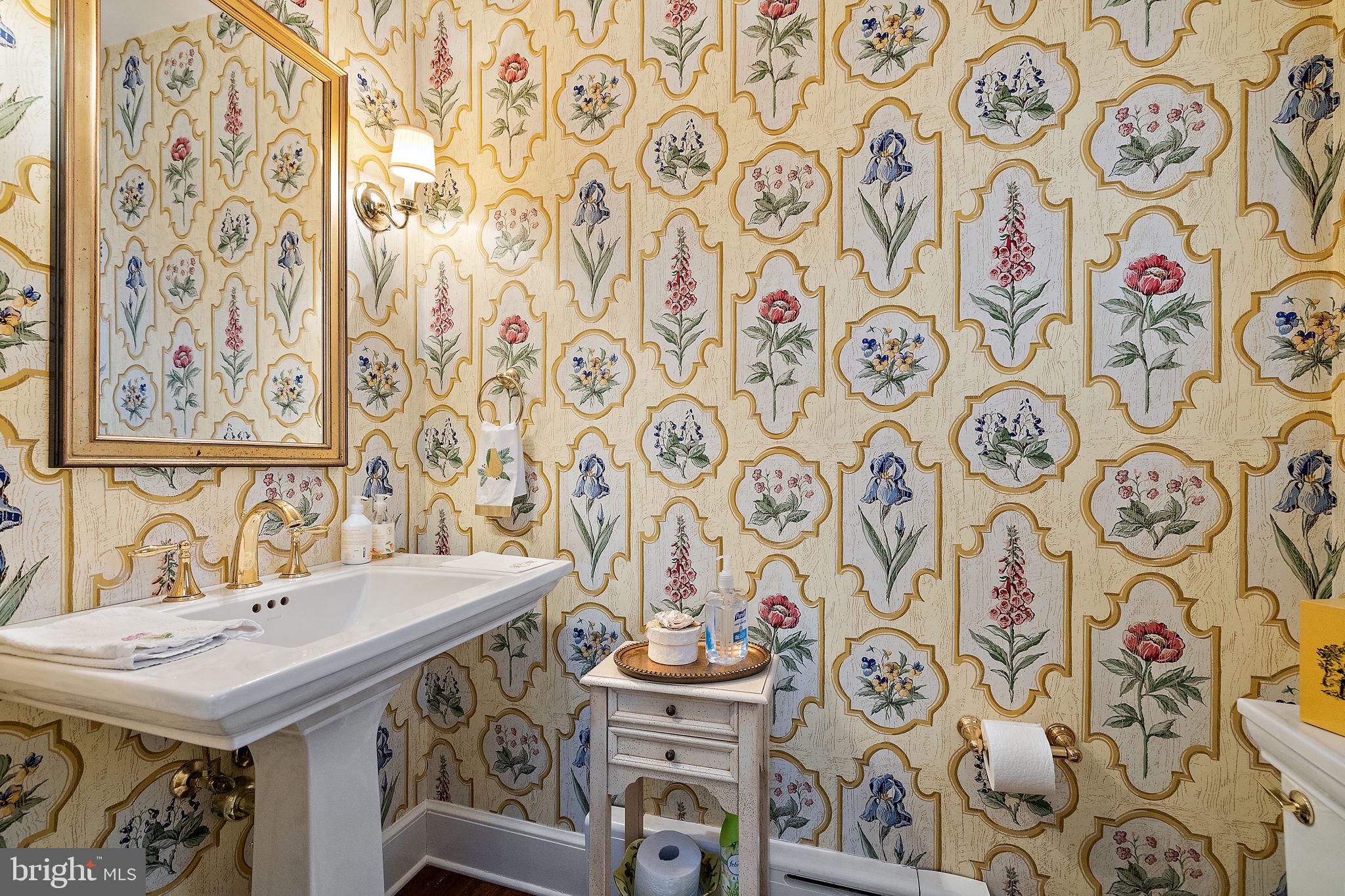 4615 Weldin Road Wilmington, DE 19803 - Photo 17 of 49 a bathroom with a sink and a mirror with painted walls