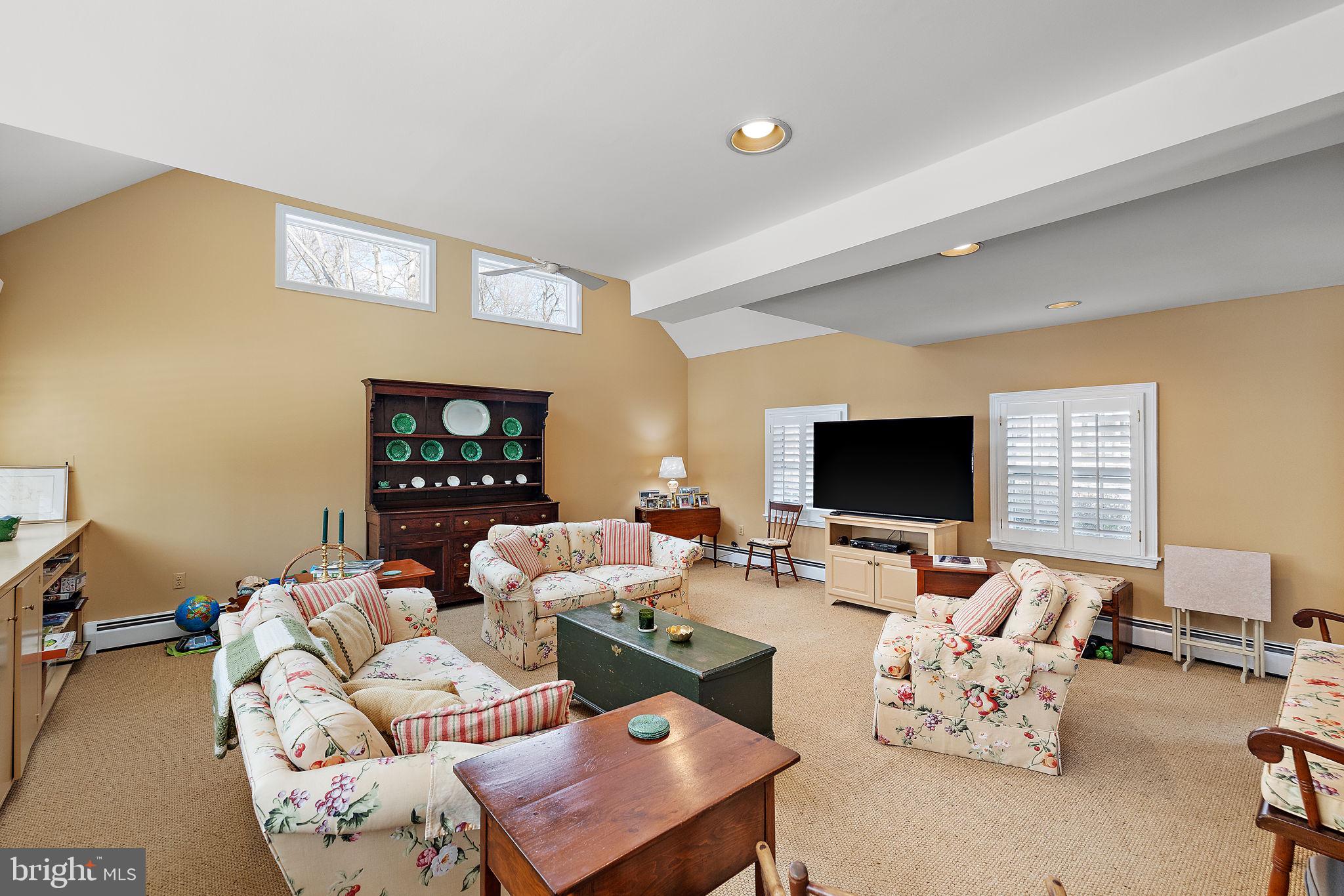 4615 Weldin Road Wilmington, DE 19803 - Photo 21 of 49 a living room with furniture and a flat screen tv
