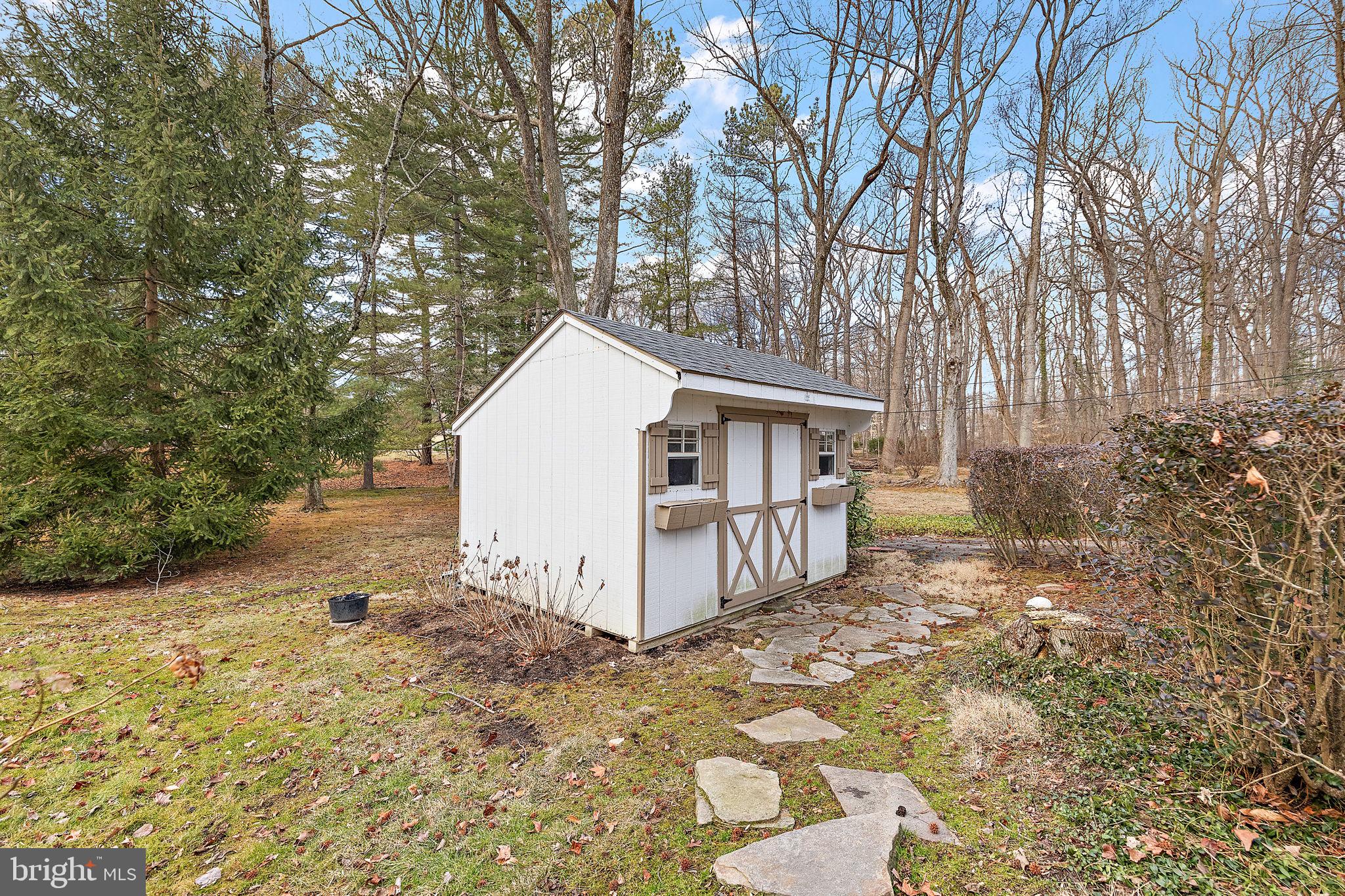 4615 Weldin Road Wilmington, DE 19803 - Photo 42 of 49 a view of a house with a yard covered in snow