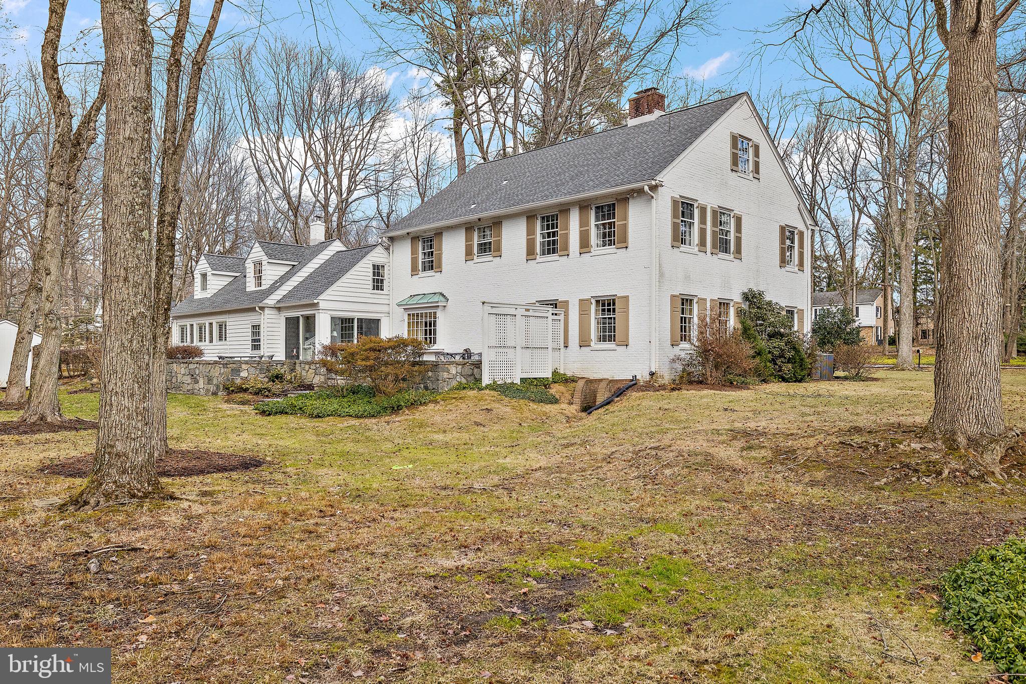 4615 Weldin Road Wilmington, DE 19803 - Photo 48 of 49 a view of a white house with a large tree next to a yard