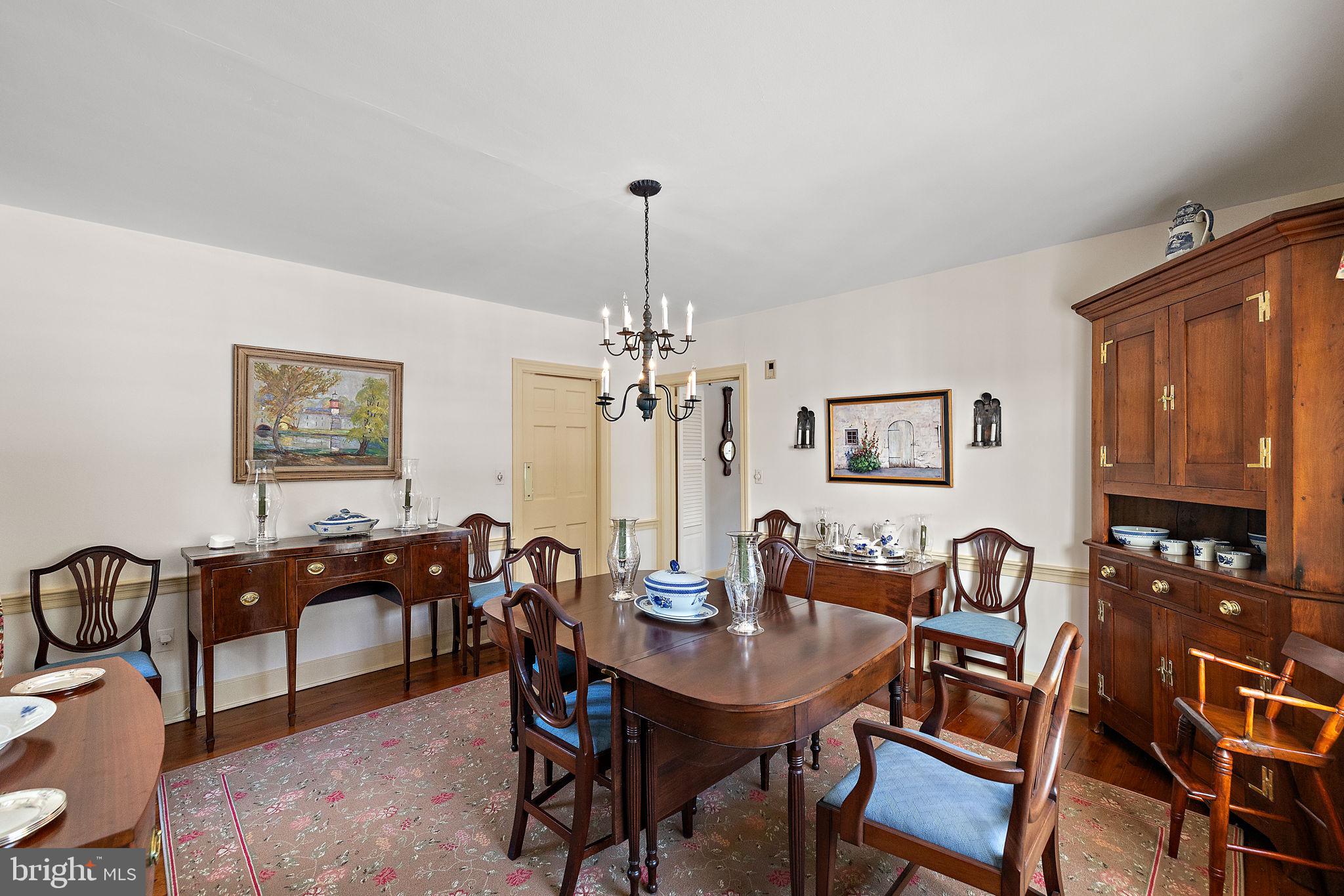 4615 Weldin Road Wilmington, DE 19803 - Photo 9 of 49 a view of a dining room with furniture window and wooden floor